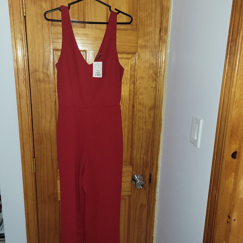 Red sleeveless jumpsuit